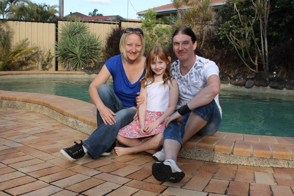 LIVING THE DREAM: Deb, Ella and Carl Wynn enjoy the Australian sunshine after moving to Capalaba from Wales. Photo: Cheryl Goodenough