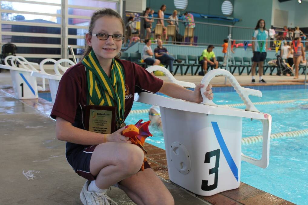 RECORD-BREAKER: Rylee Grier-Stralow won 10 medals at a recent national swimming competition in Darwin. She also broke six records. Photo: Cheryl Goodenough