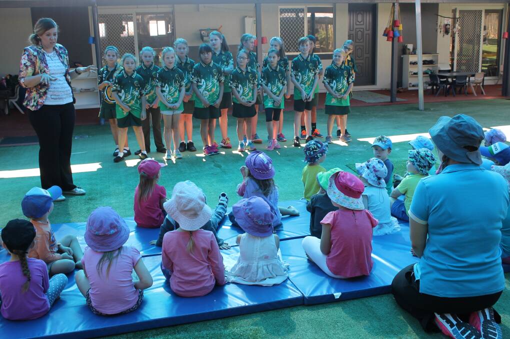 SINGERS: The Coolnwynpin State School choir performs at Goodstart Capalaba early learning centre as part of Under Eight's Week. Photo: Cheryl Goodenough