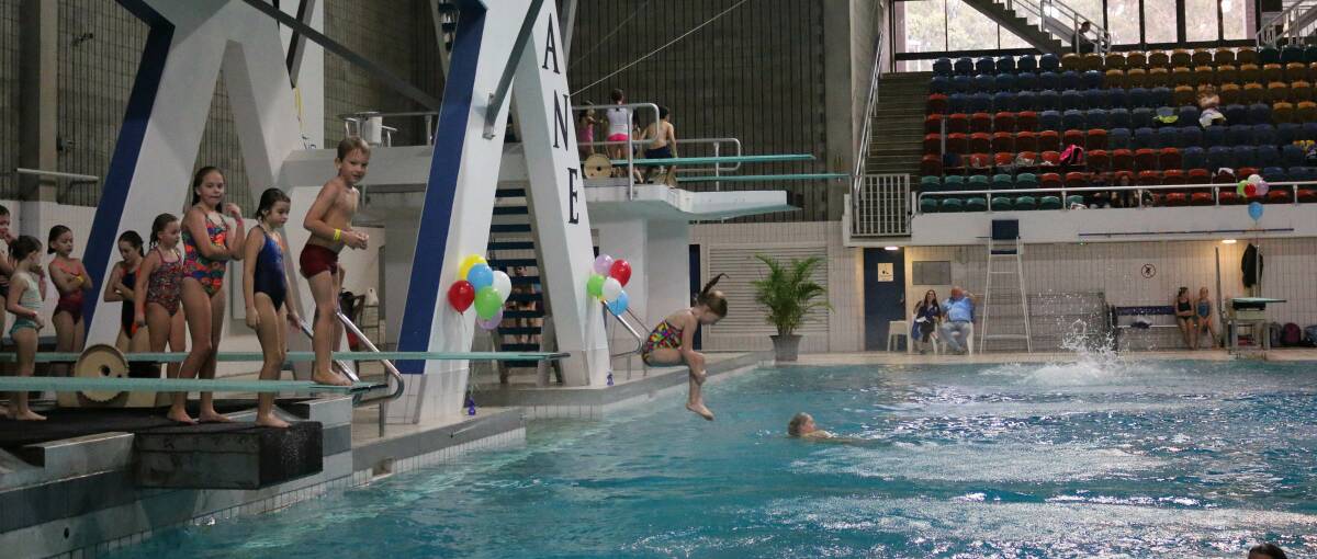 FUN DAY: Children will be able to try springboard diving at Sleeman Centre, Chandler on Sunday. Photo: Tiffany Warner Photography