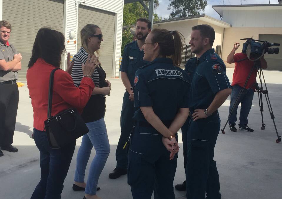 MEETING UP: Imogen Donaghy and her mother chat to the paramedics who resuscitated  Ms Donaghy when she went into cardiac arrest in a Cleveland shop in June. Photo: Cheryl Goodenough