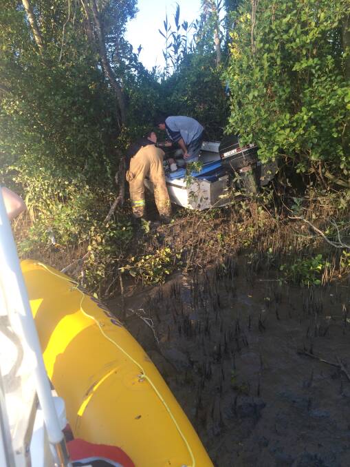 RESCUE: At the scene of a rescue after a boat crashed into the bush off Logan River. Photo: Redland Bay Coast Guard