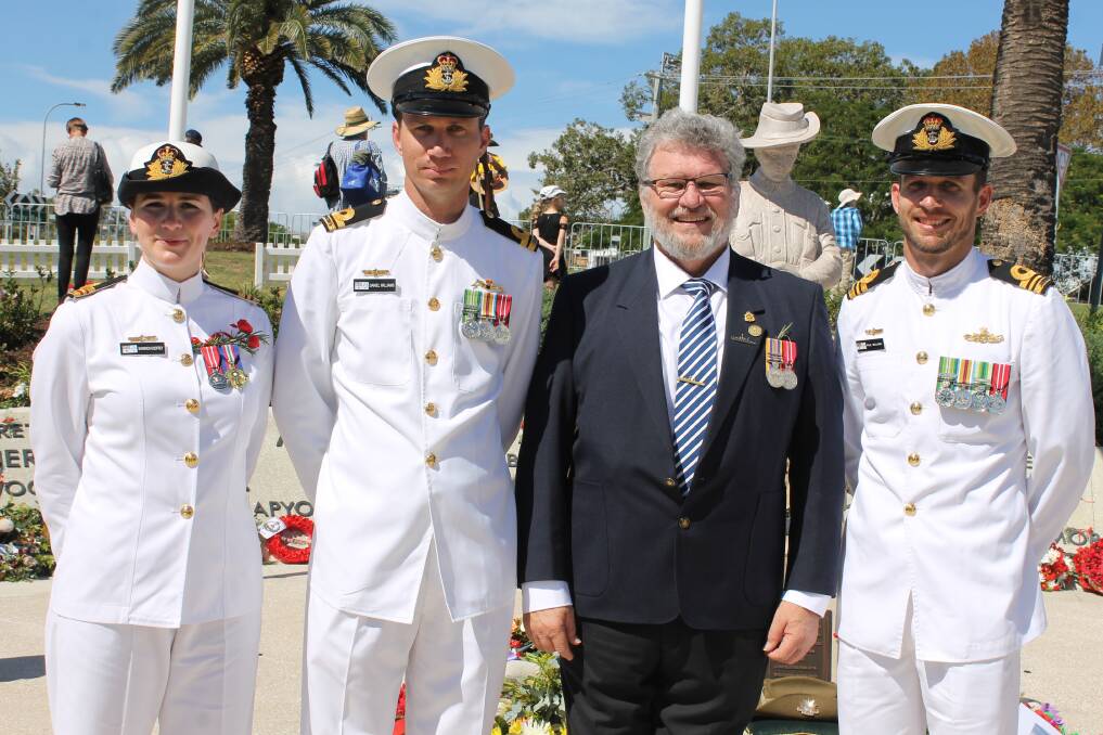 FAMILY TIES: Together on Anzac Day for the first time since being in uniform are Glenn Williams (second right), his daughter-in-law Shannon Godfrey and sons Daniel and Paul. Photo: Cheryl Goodenough