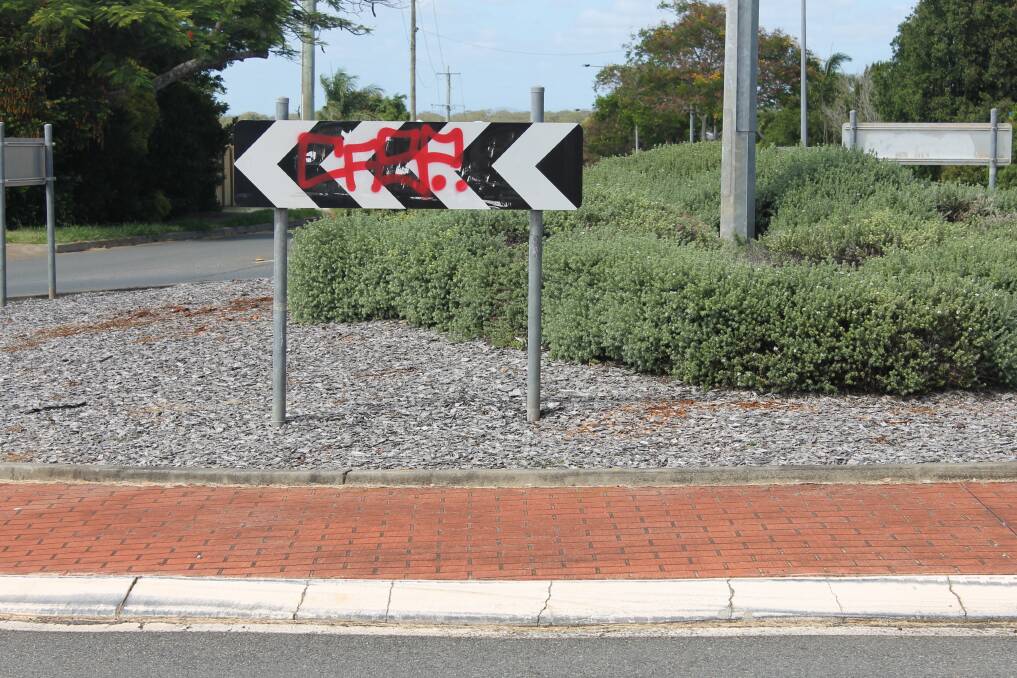TAGGED: Police are investigating the vandal responsible for tagging a sign in Queen Street in Redland Bay. Photo: Cheryl Goodenough