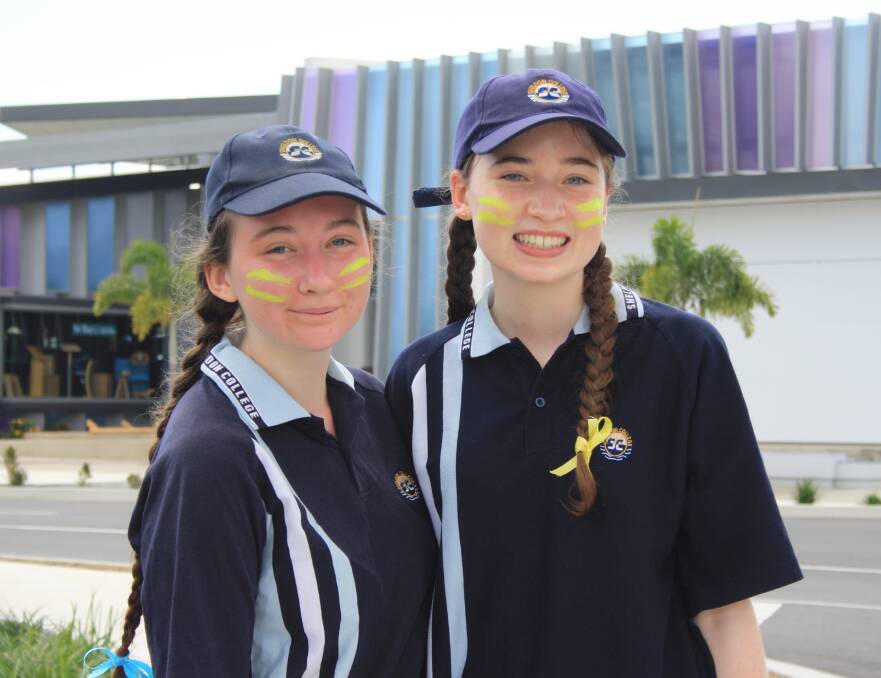 SHELDON COLLEGE: Students Maddison Genrich and Sienna Smiley promoted the One Punch Can Kill message during the walk at Sheldon College. Photo: Supplied