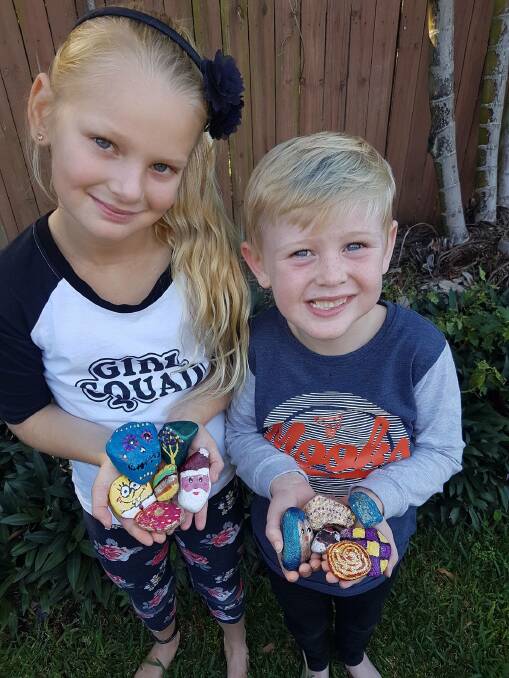 THIS ROCKS: Lily Hovell, 8, and Mason Hovell, 5, are excited to get to the park to hide the rocks they painted. Photo: Supplied