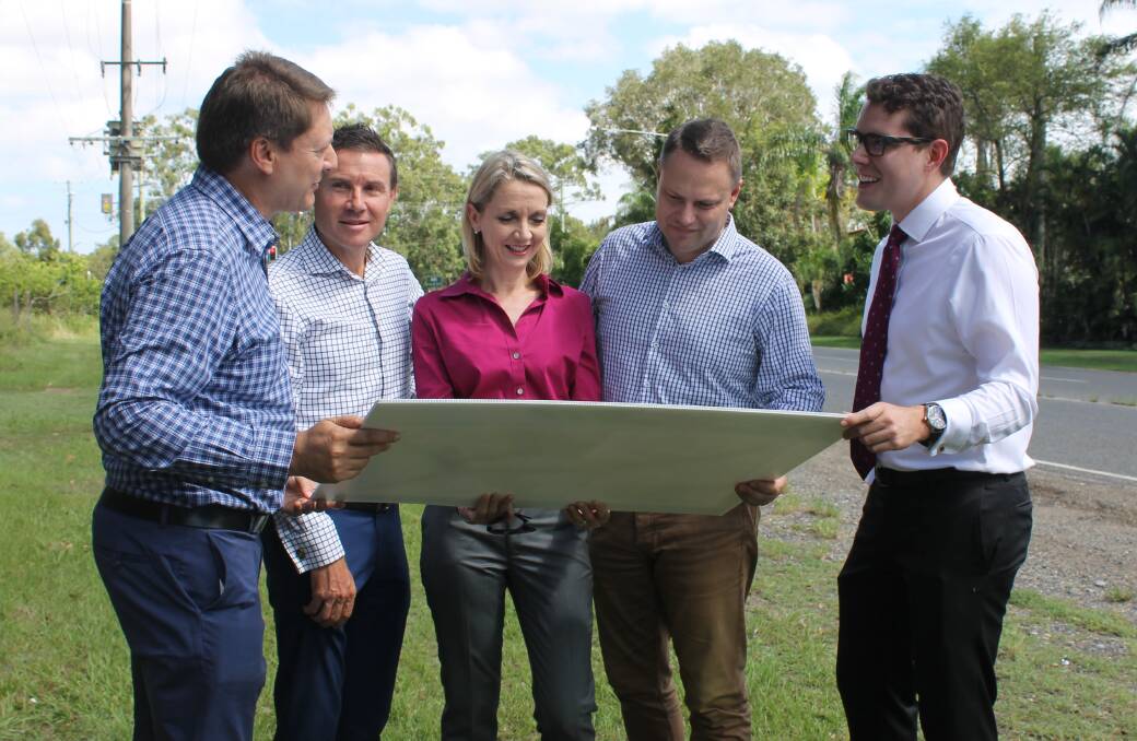 DESIGNS: Bonner MP Ross Vasta, Bowman MP Andrew Laming peruse the Green Camp Road upgrade design with Brisbane City Council's Amanda Cooper, Adrian Schrinner and Ryan Murphy. Photo: Cheryl Goodenough