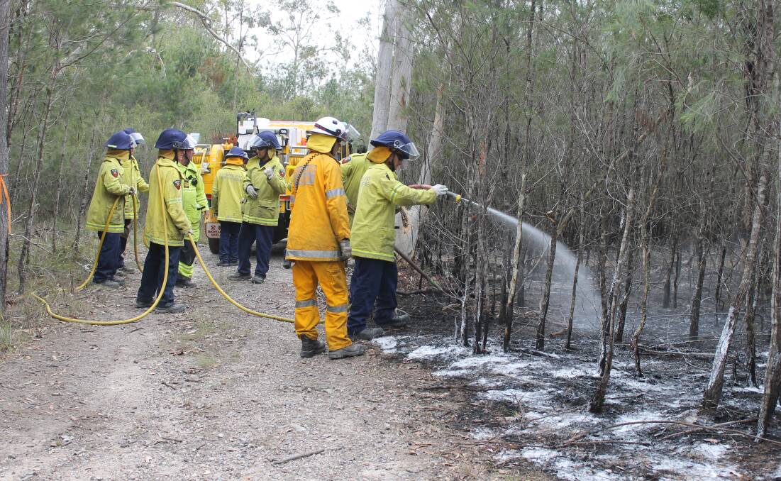FIGHTING FIRE: Queensland Parks will conduct hazard reduction burns on North Stradbroke Island. Photo: Cheryl Goodenough