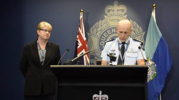 Queensland Deputy Commissioner Steve Gollschewski addresses the media with State Crime Command Detective Superintendent Cheryl Scanlon, after a 38-year-old senior constable was charged with the murder of his baby son. Photo: Kim Stephens
