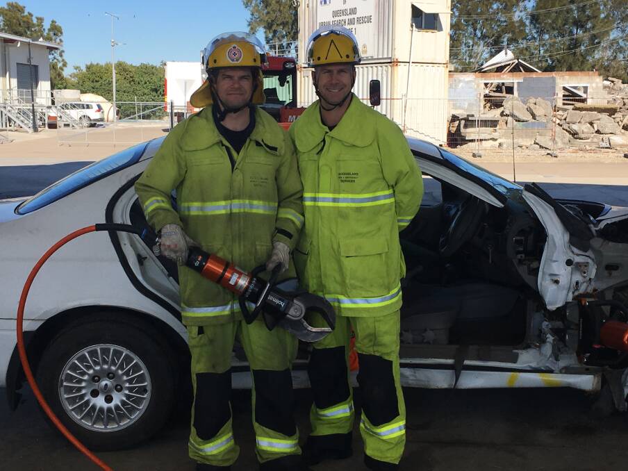 FIRIES: Senior firefighter Richard Bertossi and Acting Inspector Simon Johnstone will represent Redlands in the Brisbane team at the Australasian Road Rescue Challenge in New Zealand. Photo: Queensland Fire and Emergency Services