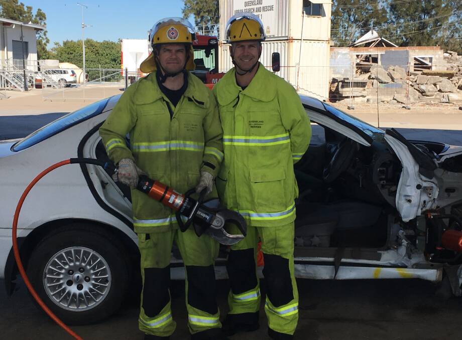 FIRIES: Senior firefighter Richard Bertossi and Acting Inspector Simon Johnstone represented Redlands in the Brisbane team at the Australasian Road Rescue Challenge in New Zealand. Photo: Queensland Fire and Emergency Services