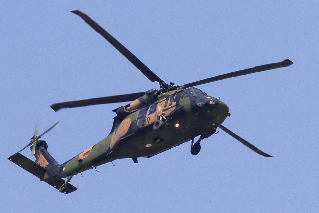 FLYING OVER REDLANDS: An army helicopter on a routine navigational exercise on Wednesday. Photo: Chris Walker
