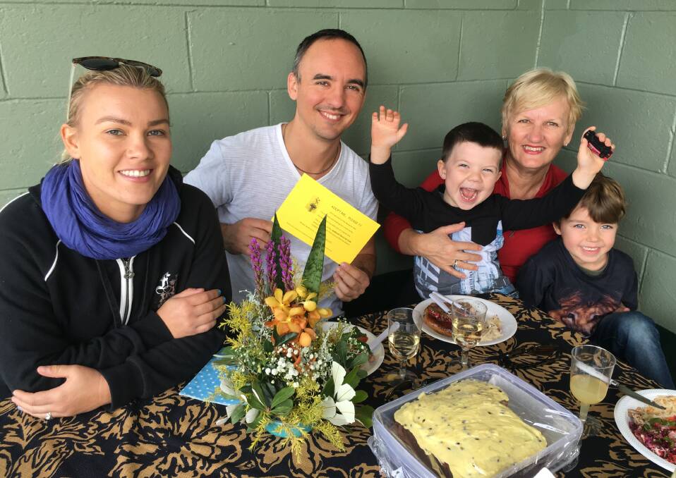 RECIPIENTS: Mel Navin and Adam and Judi Brown, with children Levi Brits and Luka Cuthel, from Birkdale. On the table is the bouquet they found in Thorneside's Beth Boyd Park.