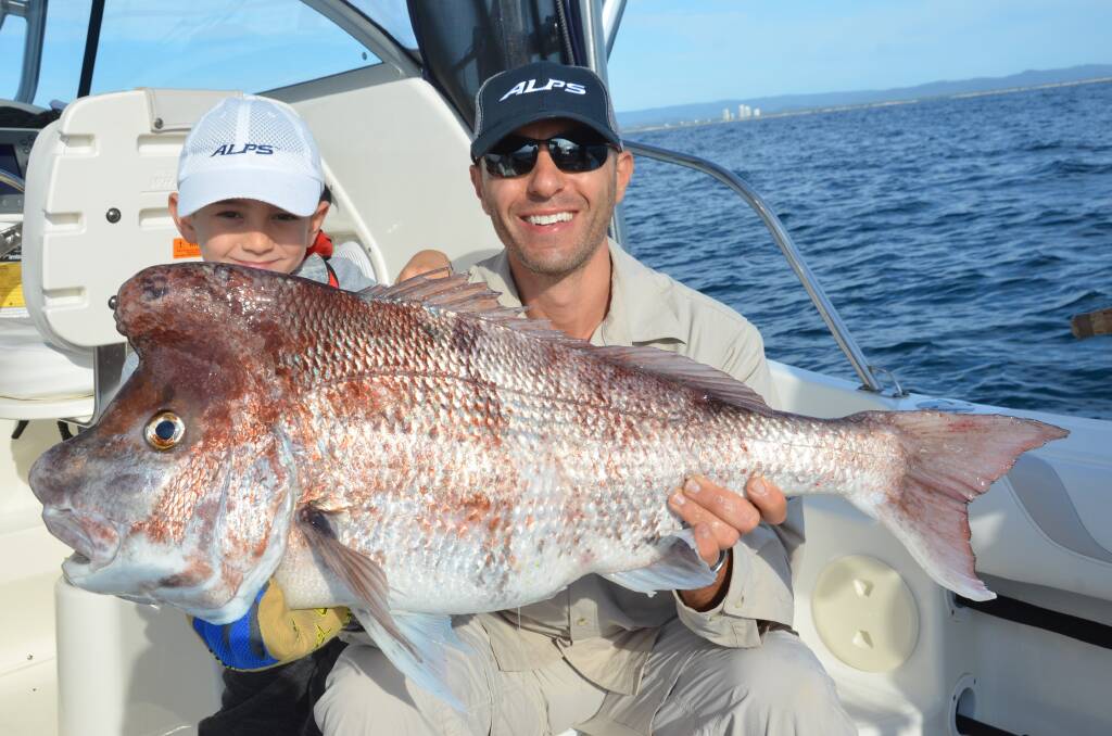 HUGE SNAPPER CATCH : Young angler seven-year-old Caelan Pace with a nine kilogram monster snapper he was lucky enough to catch off the Gold Coast Seaway at the weekend. Picture: Supplied. 