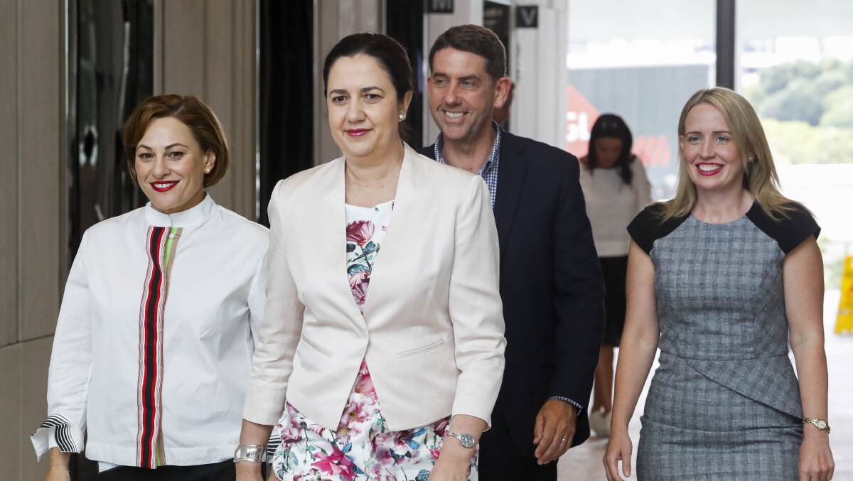 Queensland Premier Anna Palaszczuk (2nd left) with her new economic team, Jackie Trad (left), Cameron Dick and Kate Jones (right). Photo: AAP