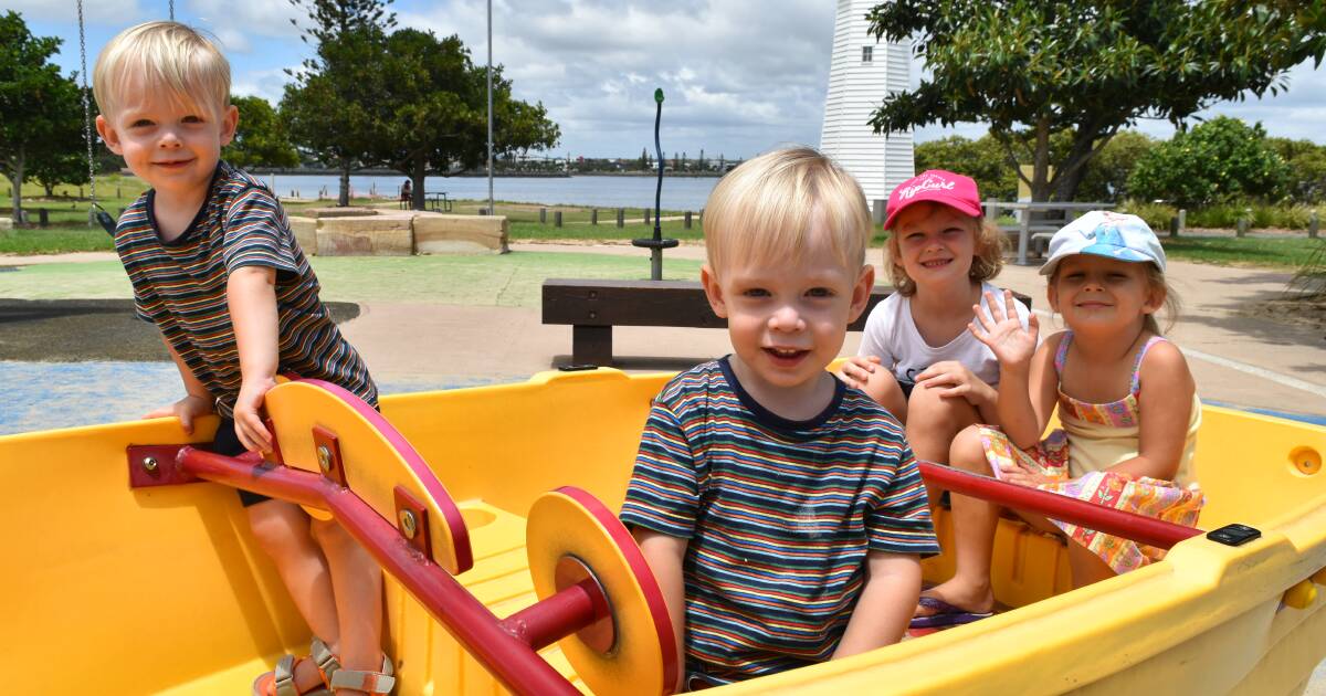 HOLIDAY FUN: Osgood twins William and Patrick, 2, with their sisters Zahara, 6, and Verity, 4, play at Cleveland Point. Photo: Hannah Baker