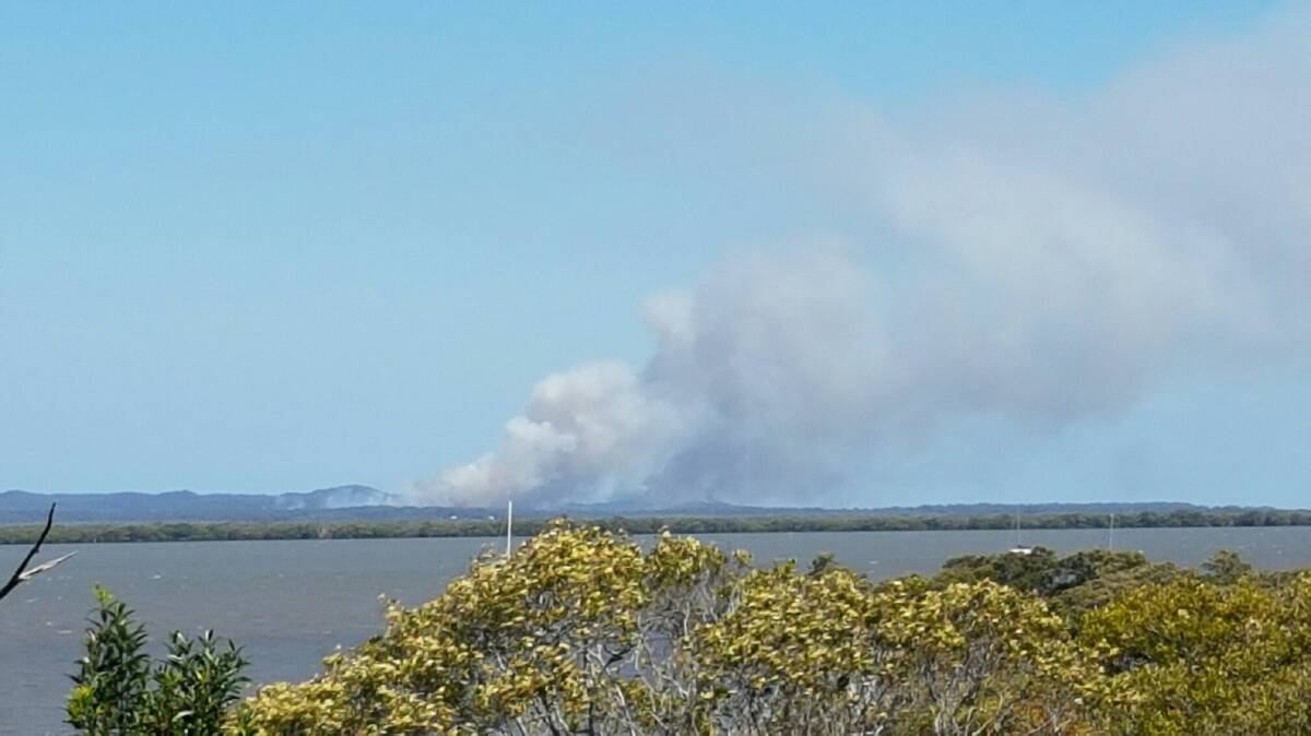BLAZE: The Russell Island fire, as pictured from Redland Bay. Photo: Supplied