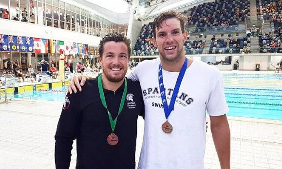 MOTIVATIONAL: Daniel Fox (right) with his friend and Paralympian Jake Templeton. The two visit schools as part of the QAS4Schools program to give talks about goal setting and sporting glory. Photo: Supplied
