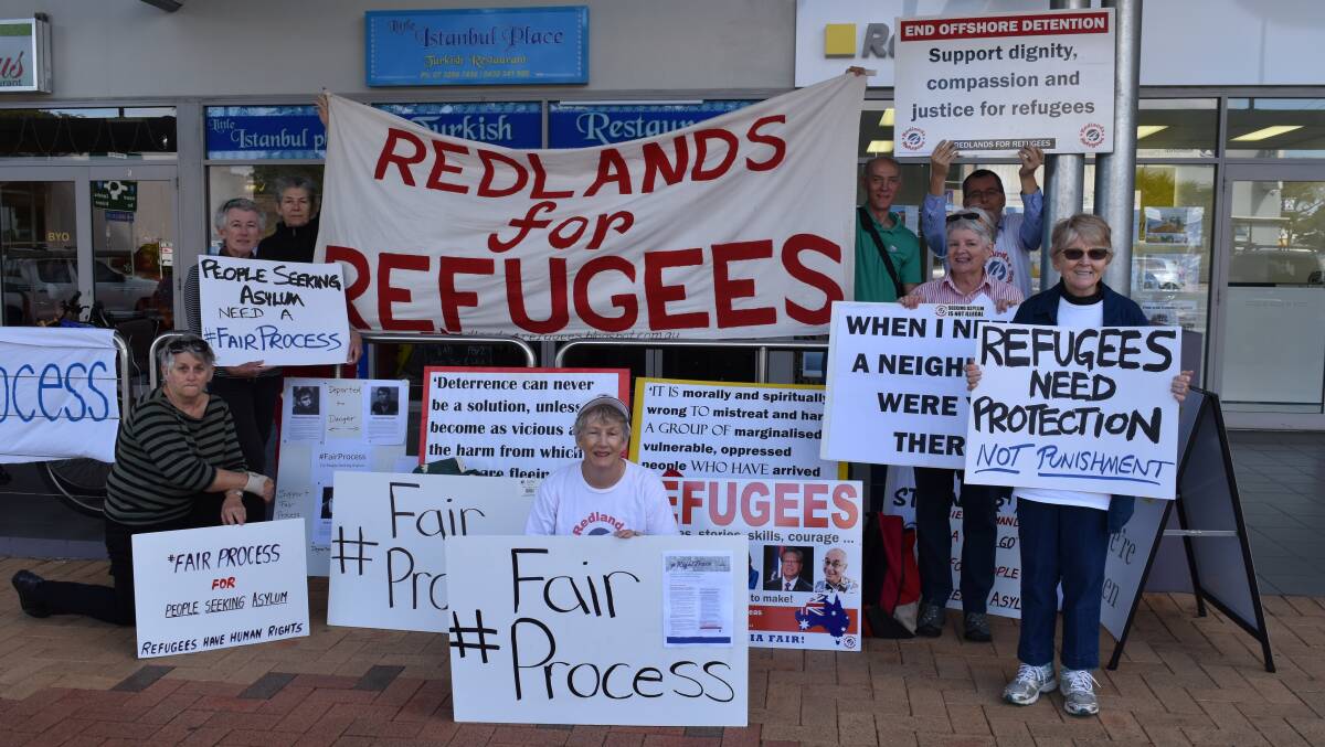 FAIRNESS TEST: Redlands for Refugees mounted a peaceful protest outside Bowman MP Andrew Laming's office in Cleveland. Photo: Hannah Baker