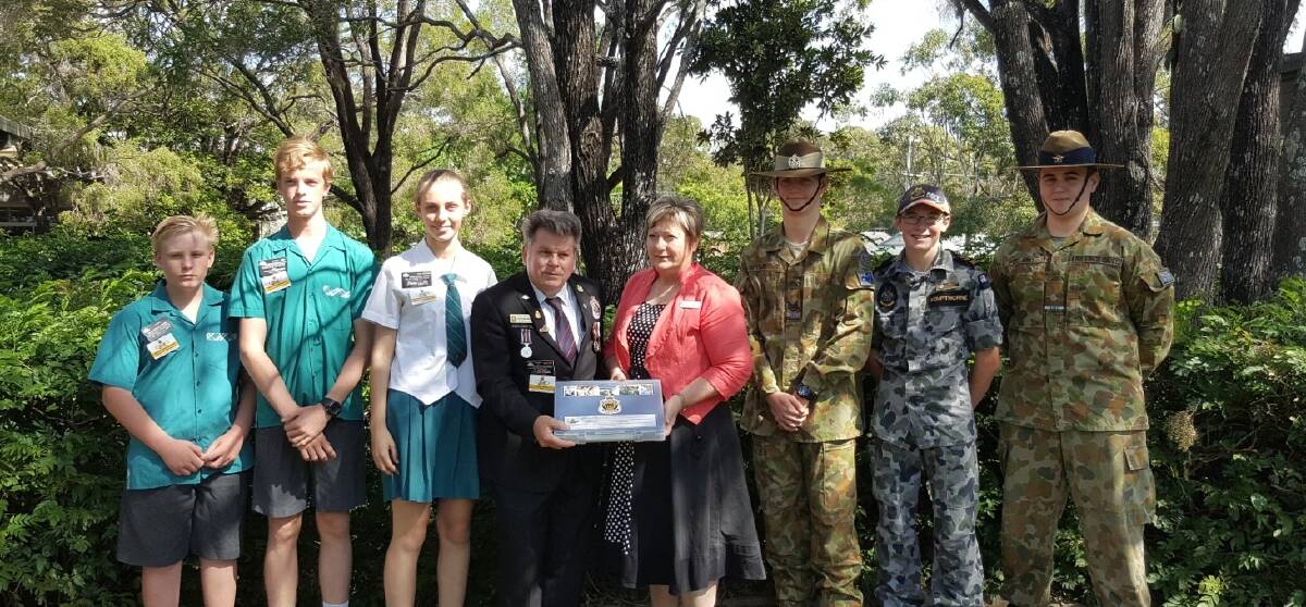 LEST WE FORGET: Charlie Searle, Year Nine, Martin Boumbach, Year Nine, Stephanie Barton, Year Ten, Community Link officer Graham Hinson, principal Dr. Robyn Burton-Ree and Year Eleven students Aiden Todd, Tristan Kempthorne and Aaron Pollard. Photo: Supplied