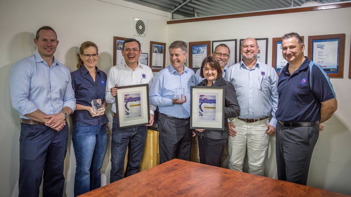 Housing, Public Works and Sport minister Michael de Brenni congratulates the Darwalla Group team for the 2017 Safety Awards. Photo: Supplied