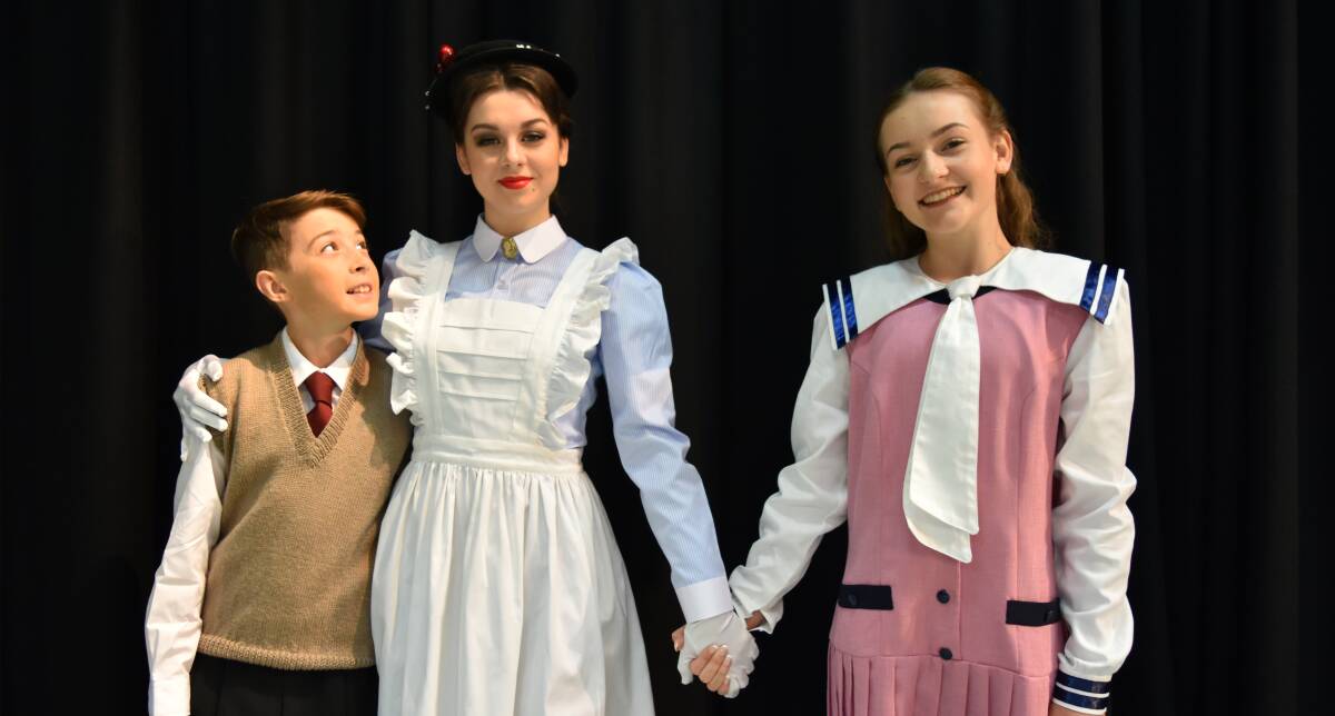 LEAD ROLES: Joseph Maher, 11, as Michael Banks, Chloe Crick, 17, as Mary Poppins, and April Beak, 15, as Jane Banks. Photo: Hannah Baker 