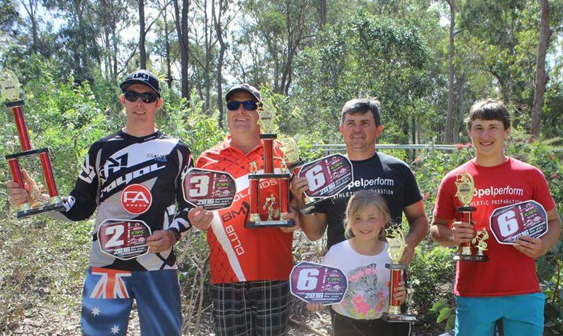 BMX: Steve Grace, Joe Tate, Ben Mitchell and Emma Torrens display their plates gained at the recent BMX State titles.