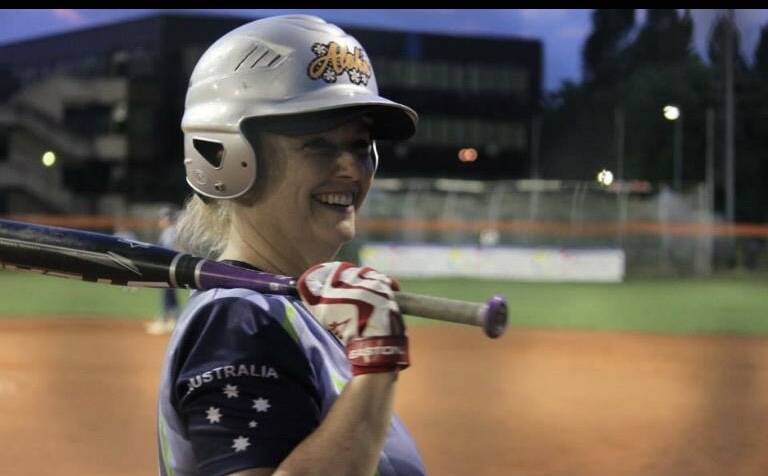 SOFTBALL: Lindy McPherson proved her softball prowess at the Masters Games in Tasmania.