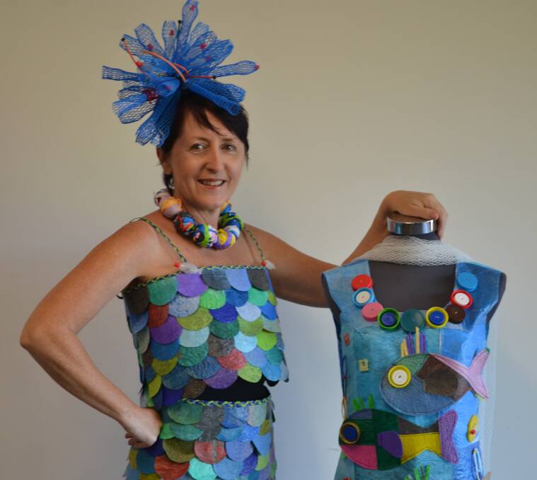WEARING ART: Karen Benjamin wears some of her creations made from recycled plastic, the subject of an forthcoming exhibition at the Redland museum.