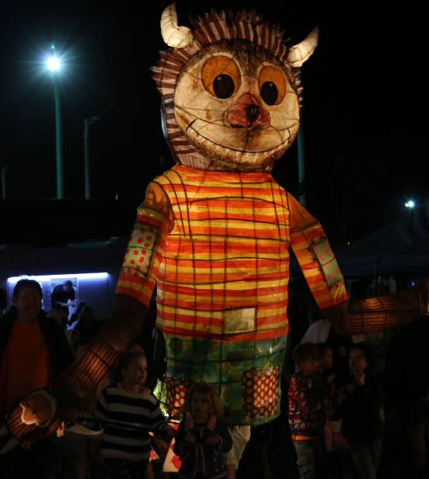 STANDING TALL: Large lit lanterns were a popular attraction in this year's lantern parade.  Children also made smaller individual lanterns to carry and keep.