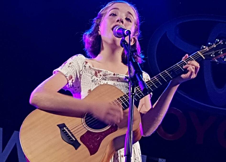 WINNER: Georgie Taylor performing her original songs at the  Fretfest Young Stars Showcase at Fanzone , Tamworth Country Music Festival 2017.