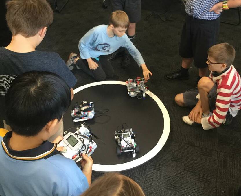 ROBOTICS: Learning aout robotics is just one activity for children being put on by Council this school holidays.