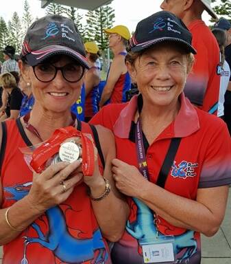 COACHES: Cora Acworth and Inge Meier are chuffed to coach and participate in winning dragon boat teams at State and national events.