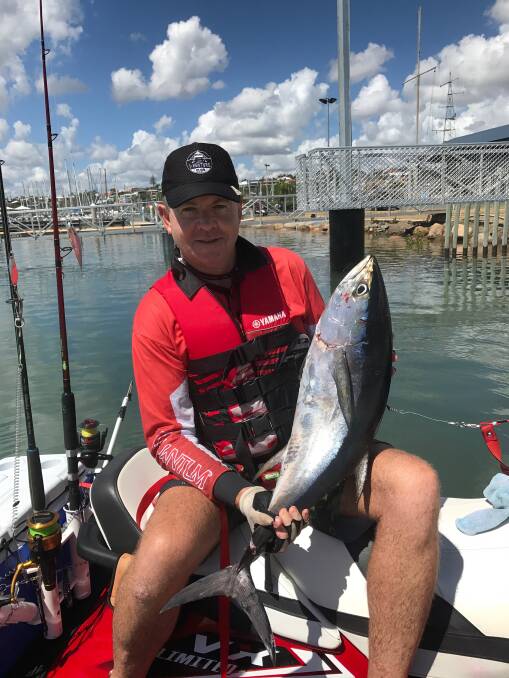 Paul Hayes with a 10kg longtail tuna caught inside Moreton Island from a jetski.