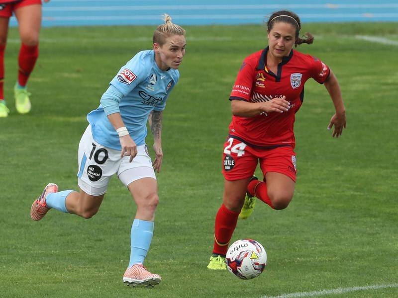 Jess Fishlock (L) hasn't indicated whether she'll be part of Melbourne City's next W-League season.