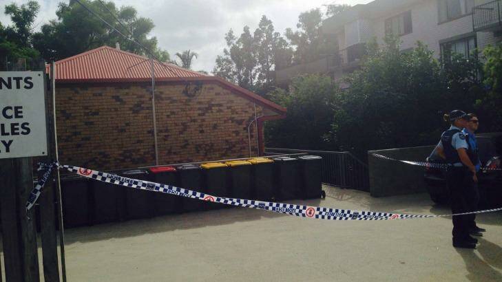 Police have established a crime scene at the apartment complex in Highgate Hill. Photo: Kim Stephens