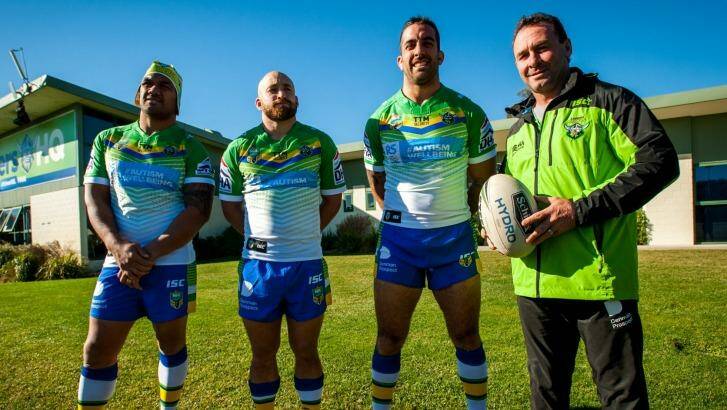 Canberra Raiders players Jeff Lima, Kurt Baptiste and Paul Vaughan show off the special Ricky Stuart Foundation jerseys they will wear against Canterbury on Sunday to help raise money and awareness for autism. Photo: Elesa Kurtz