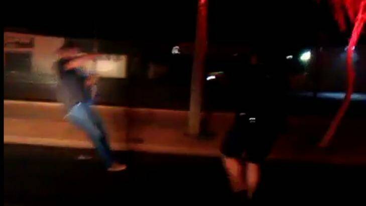 Stills from a video showing a confrontation between a man and police in Mt Isa. The man was tasered during the incident, but was later found not guilty by a Magistrate. Photo: Supplied