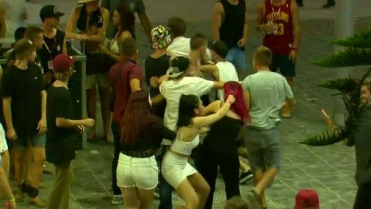 A brawl breaks out during schoolies celebrations on the Gold Coast. Photo: Nine News