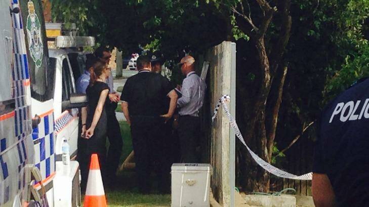 Police at the scene of a suspected stabbing murder. Photo: Kim Stephens