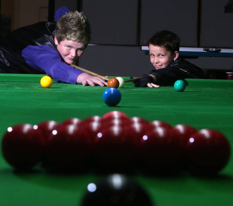 Young cue sport aces Hayden Goode, 14 (left) and Jayden Dinga, 9, were both recently crowned as national champions for their age groups. Photo by Stephen Archer