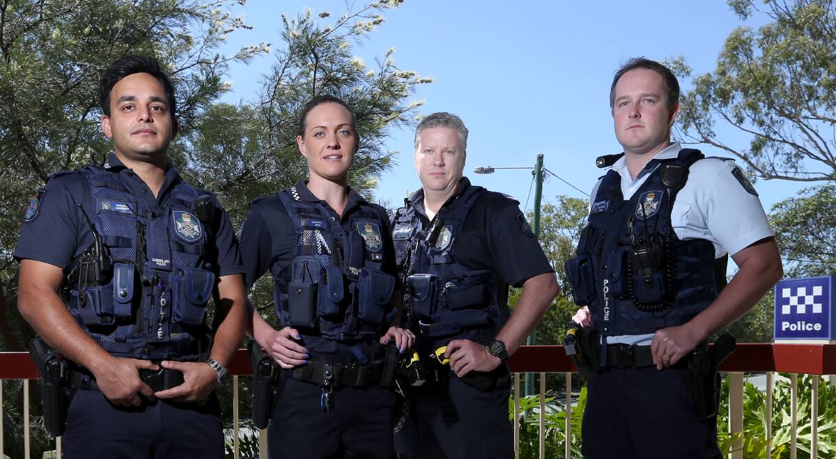 Police are encouraging people to remain vigilant, but not scared as Australia s increased security alert has local police wearing vests and side arms at all times while on duty, both inside police stations and out in the community. Pictured ready for any event are Capalaba Police Station constables, from left, Sachin Nair, Annie Solomon, Jason Mole and Murray Cavanagh. Photo by Stephen Archer