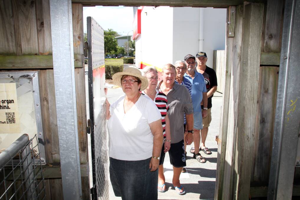 Concerned residents adjoining a parcel of land between Sycamore Parade and the Victoria Point Town Centre shopping centre stand at the gate that is sometimes left open at night allowing undesirables to access the area.l-r- Maria Sealy, Dorn Sullivan, Ray Dunn, George Speight, Clarence Cooke and Martin Sealy.Photo by Chris McCormack