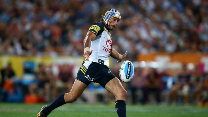 The moment: Thurston on his way to nailing the match-winning field goal in golden point extra time. Photo: Mark Kolbe
