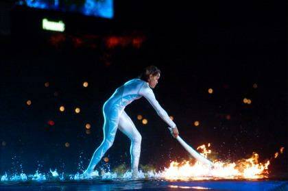 Queenslander Cathy Freeman lit the flame at the Sydney 2000 Olympic Games opening ceremony. Will a flame be lit in her home state come 2028? Photo: Victoria Arocho