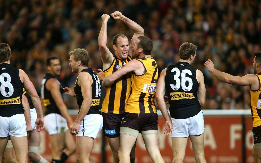 Jarryd Roughead celebrates with David Hale during last year's preliminary final win against Port Adelaide. Photo: Pat Scala