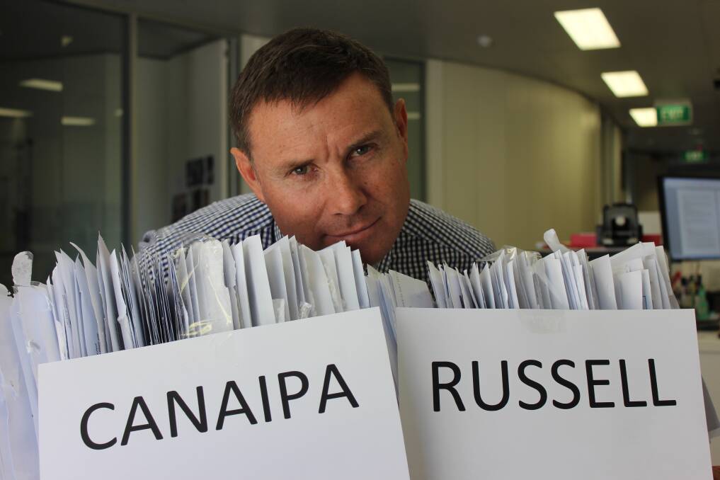 Bowman MP Andrew Laming with polling from Russell Island. 
 The vote is running 50/50.