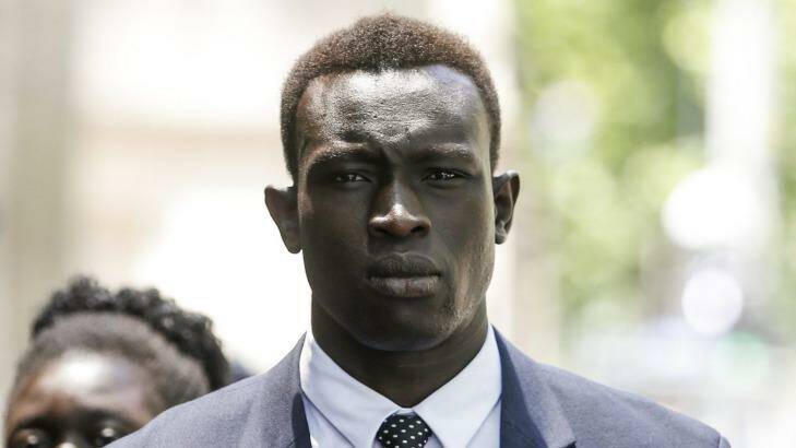 North Melbourne player Majak Daw arrives at the County Court.. Photo: Eddie Jim