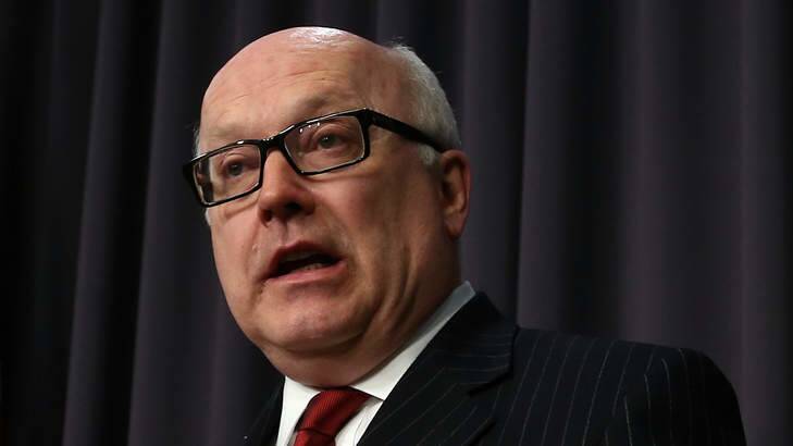 Attorney-General George Brandis says same-sex marriage law changes could be delayed many years if the plebiscite is not held. Photo: Alex Ellinghausen