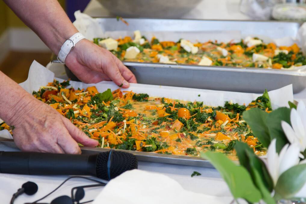 Maggie Beer's pumpkin, brie, tomato, kale and basil frittata, topped with hommus and pesto. Photo by Brad Wagner